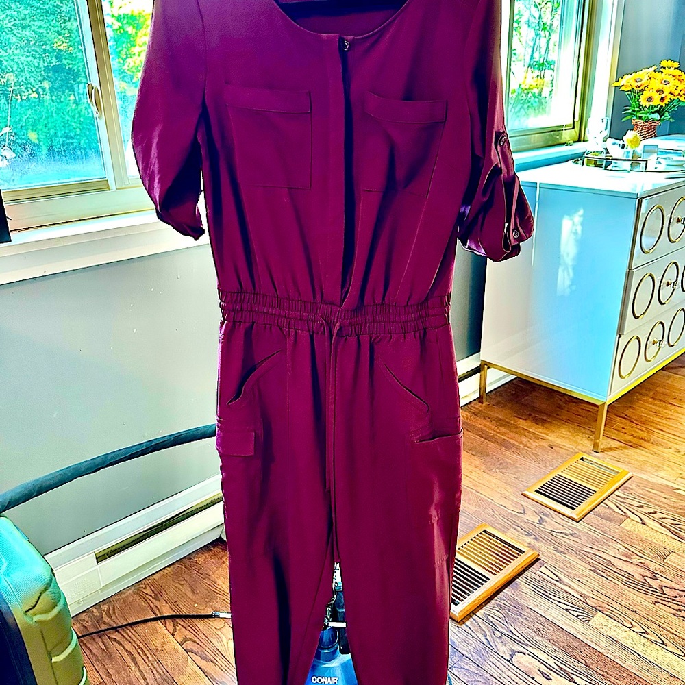 NY & Company burgundy/plum jumpsuit with tons of pockets